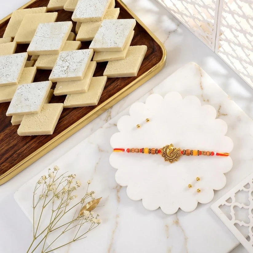 Divine Golden Ganesha Rakhi