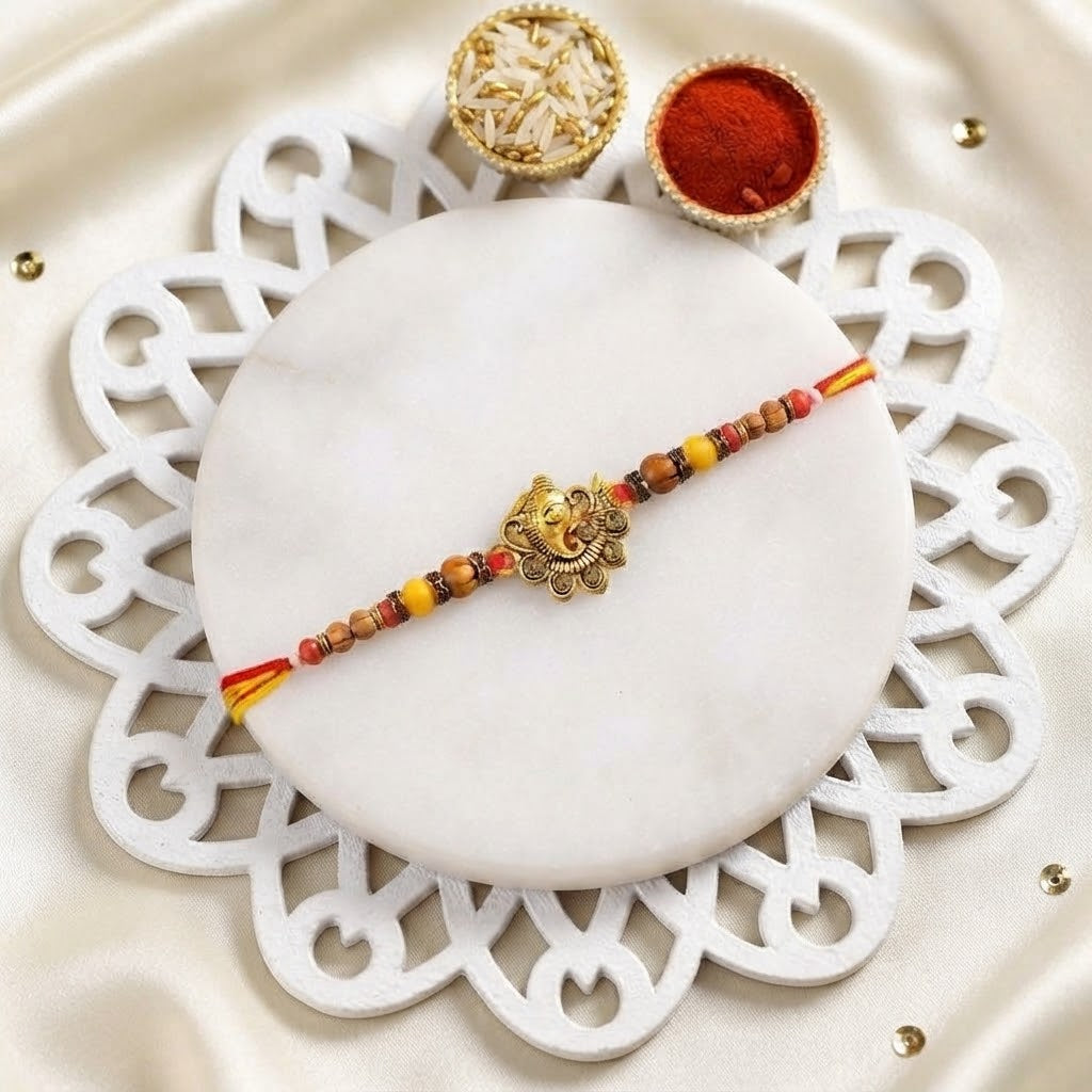 Divine Golden Ganesha Rakhi