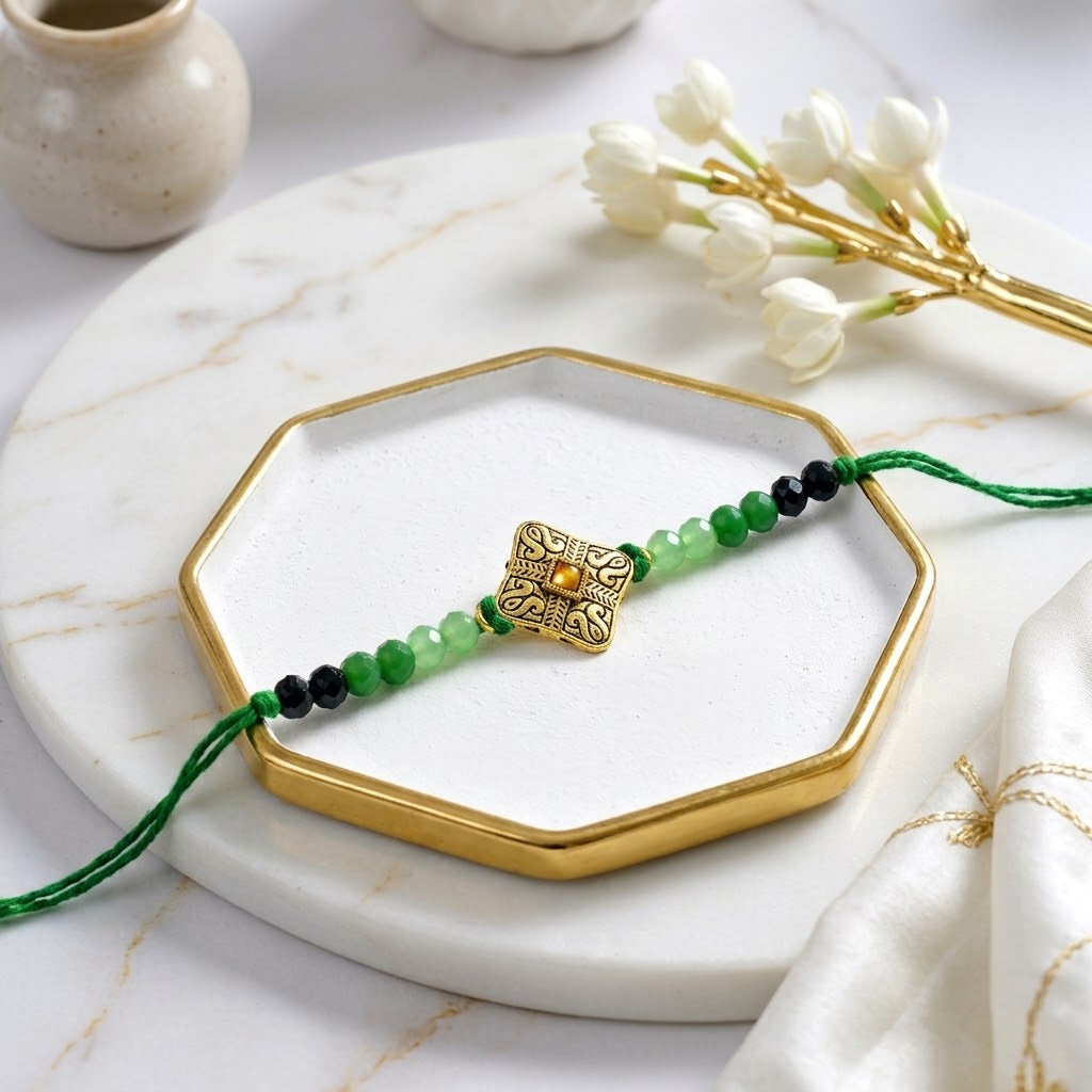 Blessed Golden Mantra Rakhi with cashews and Ferrero Rocher