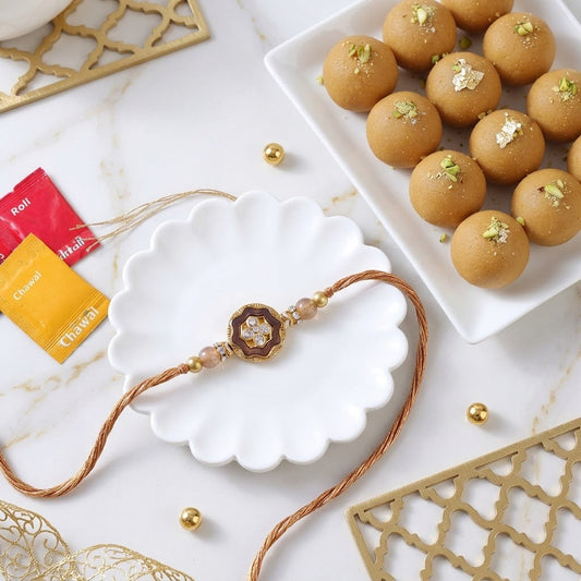 Blushing Rose Gold Flower Rakhi with Besan Laddu