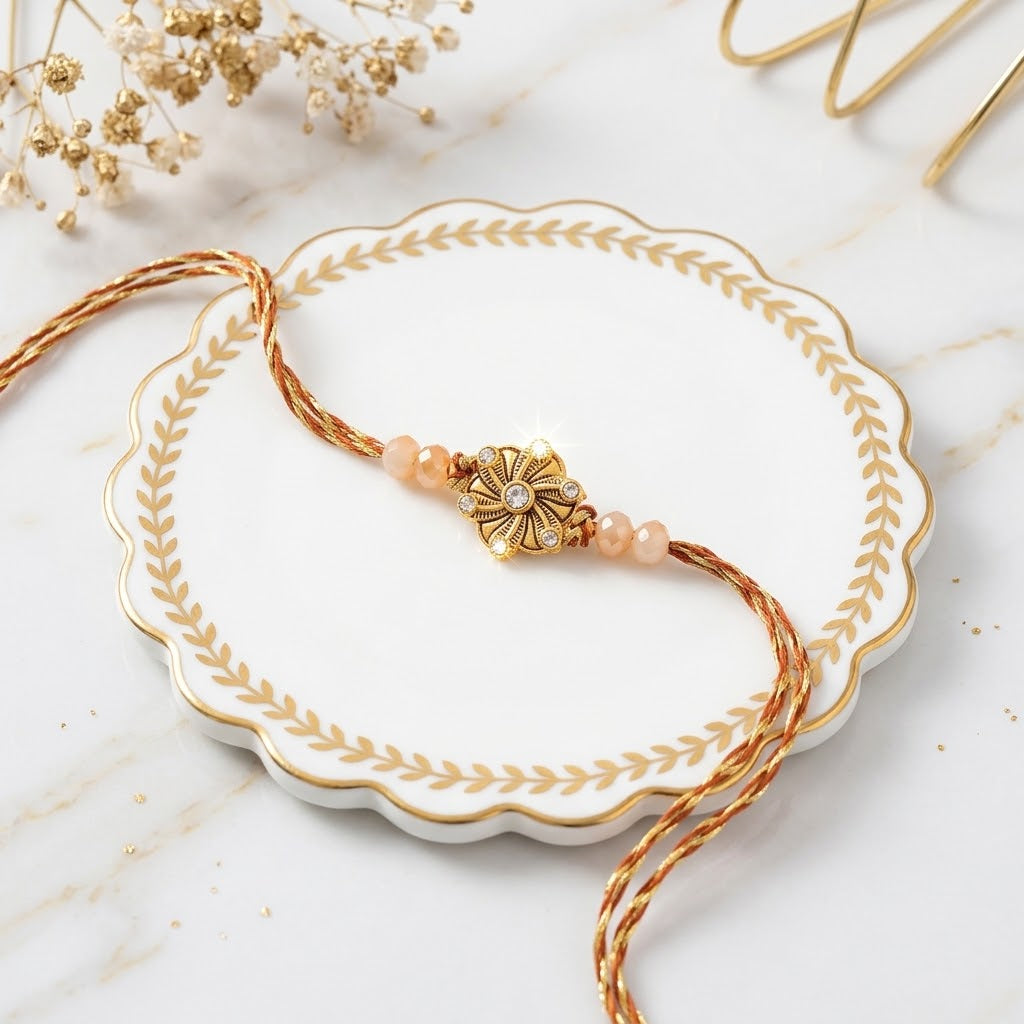 Timeless Golden Flower Rakhi with Assorted Nuts