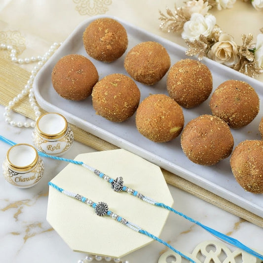 Sacred Ganesha & Surya Rakhi Set With Besan Laddu