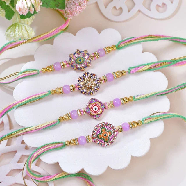 Designer 4-Piece Rakhi Collection with Traditional Besan Laddu