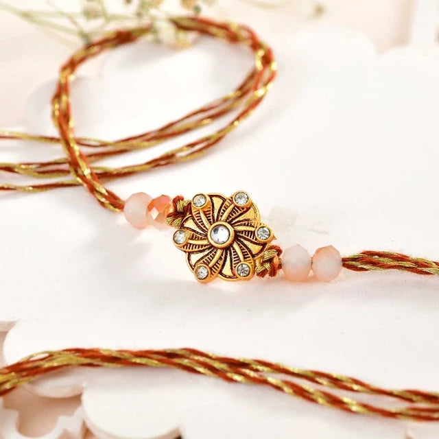 Timeless Golden Flower Rakhi with Lindt Chocolate