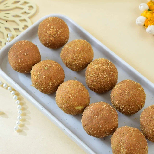 Sacred Ganesha & Surya Rakhi Set With Besan Laddu