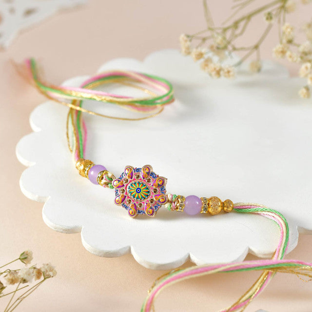 Designer 4-Piece Rakhi Collection with Traditional Besan Laddu