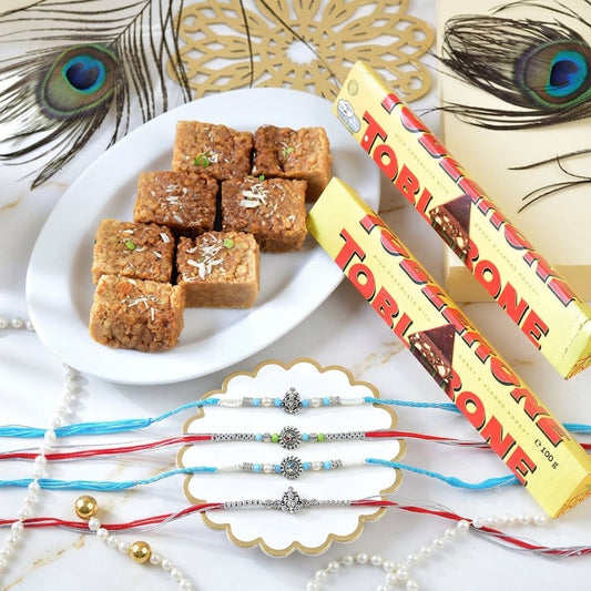 4 Piece Sacred Blessings Rakhi With Milk Cake & Toblerone